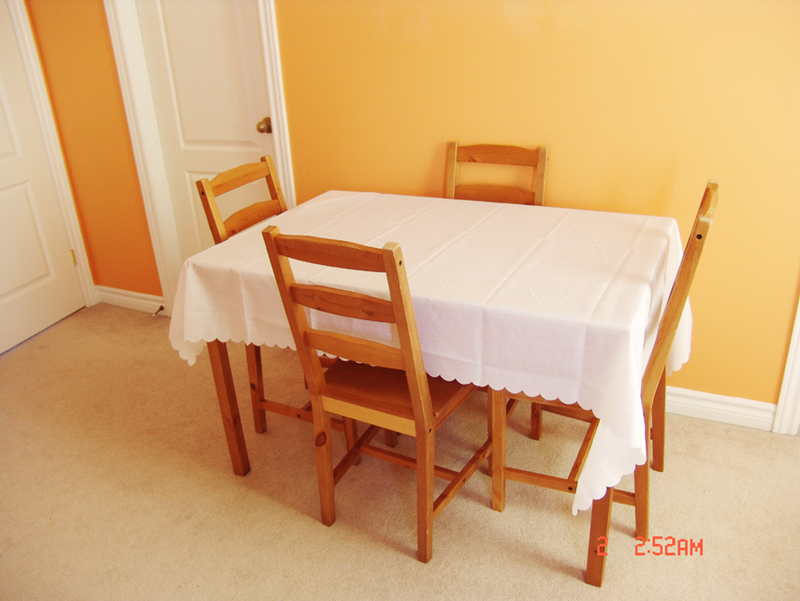 Ikea dining table with covers.jpg